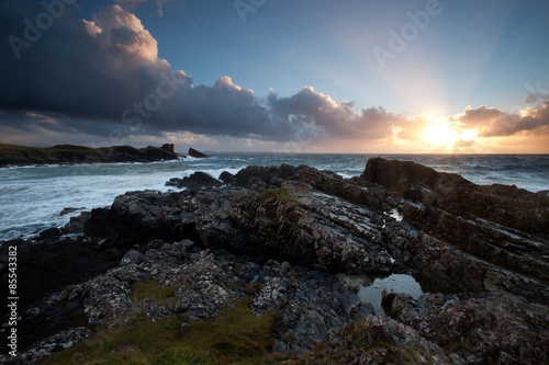 Dramatic coastal sunset photo