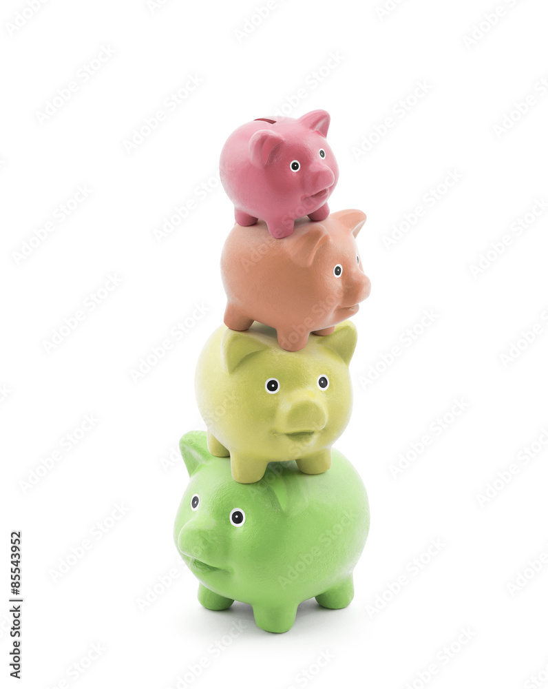 Stack of colorful piggy banks. Energy saving concept. 
