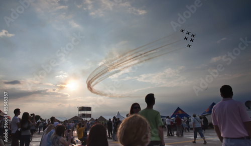 AIRSHOW, ROMANIA JUNE 20TH: AIR FORCES PERFORMING AEROBATIC EXERCISE  photo