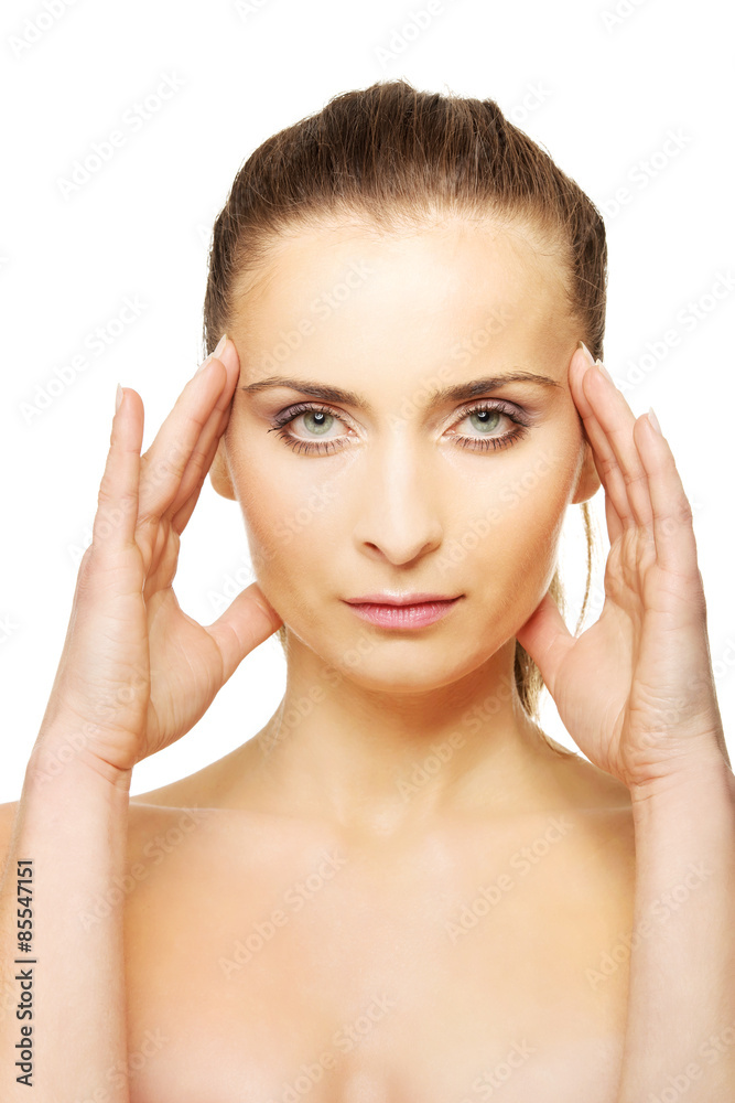 Spa woman with make up touching her face. Spa woman with make up touching her face.