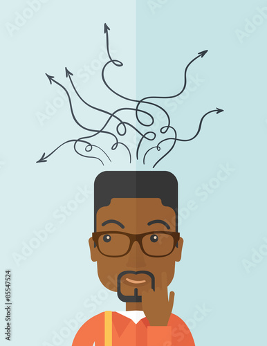 Confused black businessman standing with many arrows.