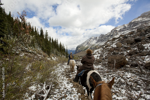 horseback riding through Plain of Six Glaciers Banff © nickjene