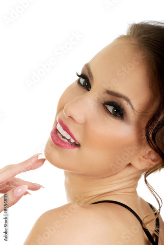 Elegant woman with curly hair.