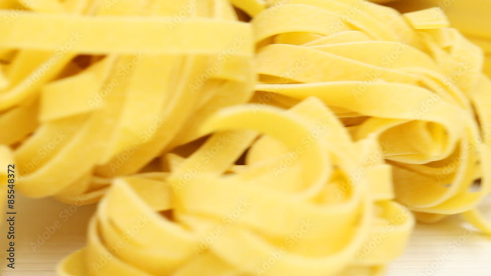 Collection from mixed raw pasta - spaghetti, farfalle and tagliatelle Collection from mixed raw pasta - spaghetti, farfalle and tagliatelle