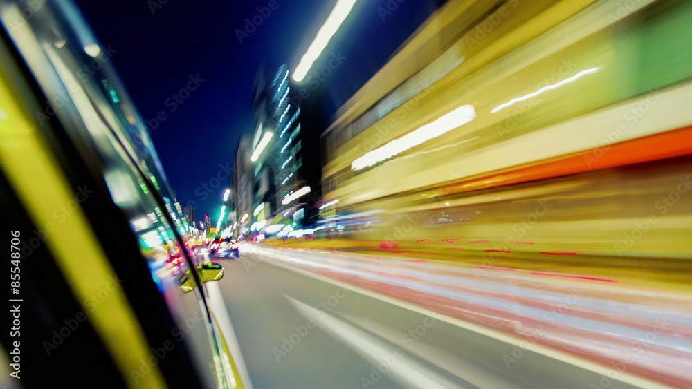 Point of view time-lapse (hyperlapse)  through the city at night by car. Tokyo, Japan