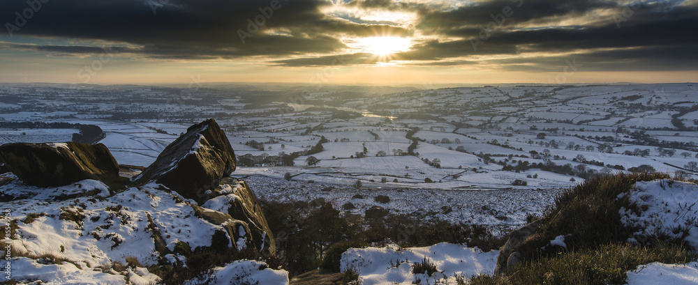 Fototapeta premium Stunning Winter panoramic landscape snow covered countryside wit