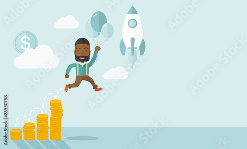 African businessman holding balloons.