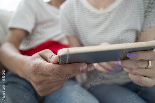 Couple watching a movie together in the smartphone