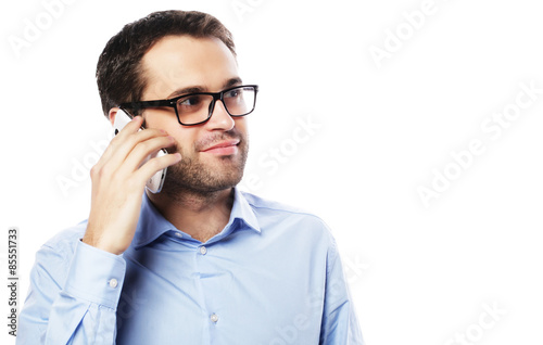 Young business man using mobile phone.