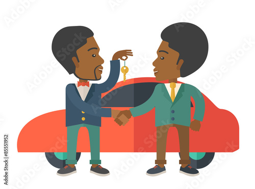Black man handed a key to other black man.