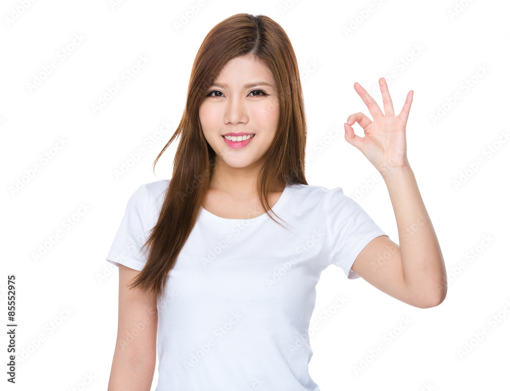 Asian woman with ok sign gesture Asian woman with ok sign gesture