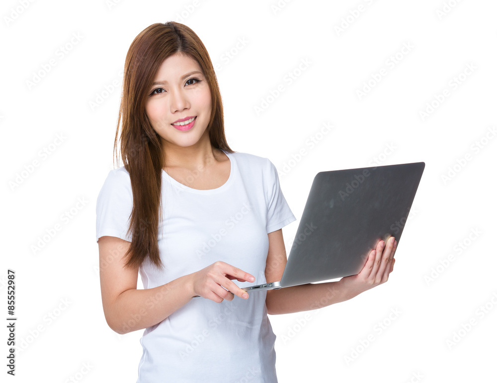 Young woman use of notebook computer Young woman use of notebook computer