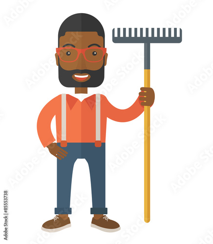 Man with a mustache holding a rake.