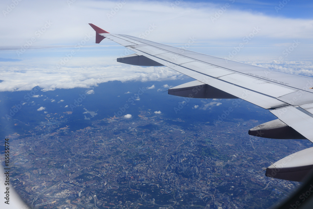 Obraz premium view from the airplane window, cloudy day