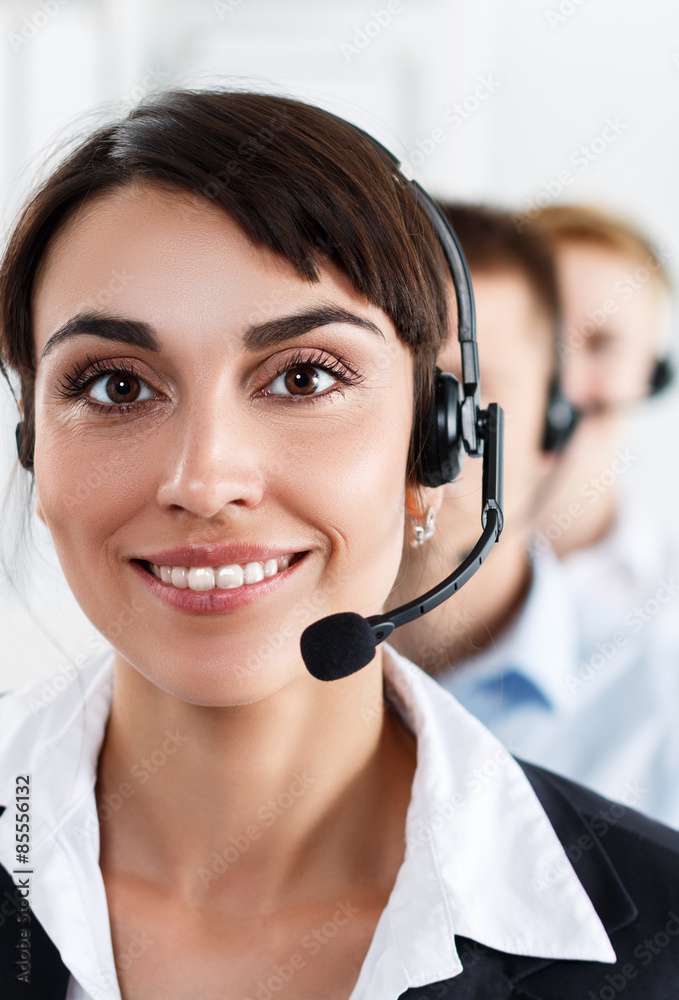 Three call center service operators at work Three call center service operators at work