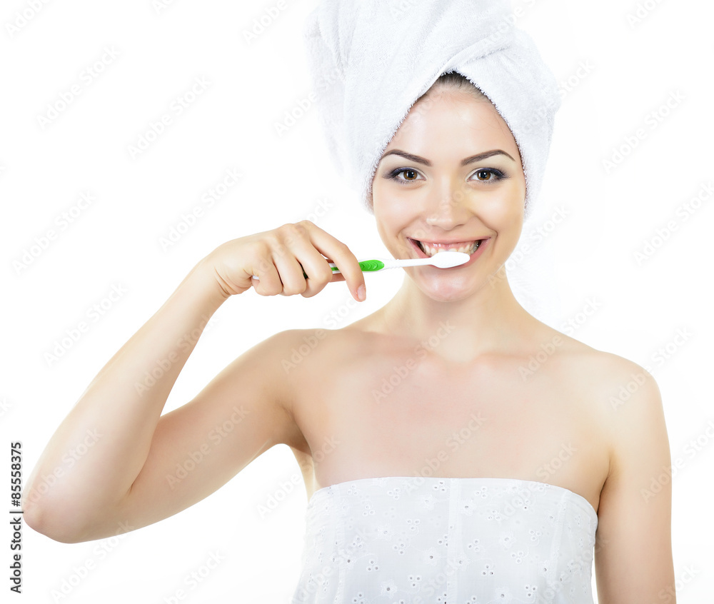 Young fresh cheerful woman with tooth-brush and bath towel over Young fresh cheerful woman with tooth-brush and bath towel over
