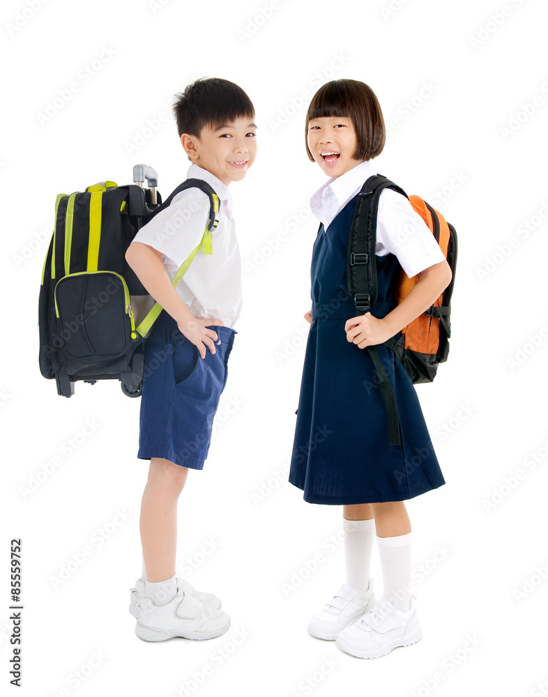 Asian primary school students in uniform and carried school bag Asian primary school students in uniform and carried school bag