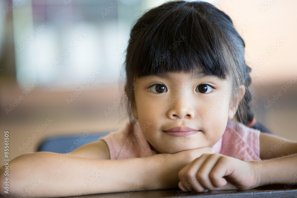 Portrait of a little Asian child girl looking at camera Portrait of a little Asian child girl looking at camera