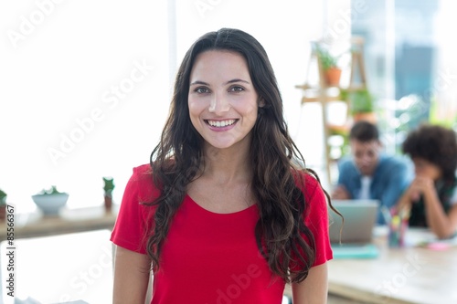 Smiling businesswoman looking at the camera Free Download Smiling businesswoman looking at the camera - GFXLoad