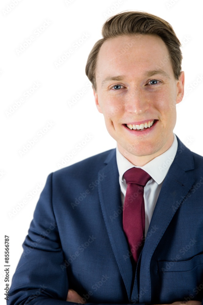 Happy businessman looking at camera with arms crossed Happy businessman looking at camera with arms crossed