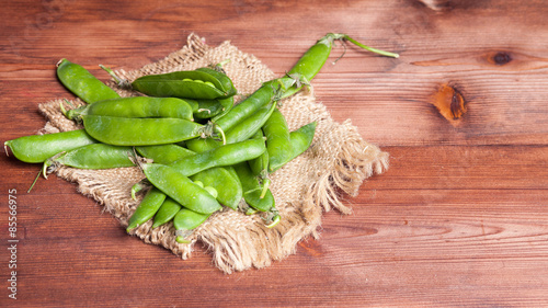 peas on wooden desk