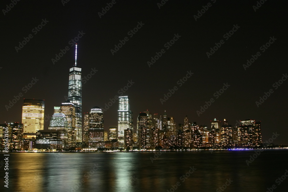 Manhattan night  view with skyscrapers  on the left