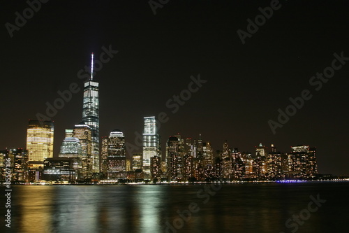 Manhattan night  view with skyscrapers  on the left