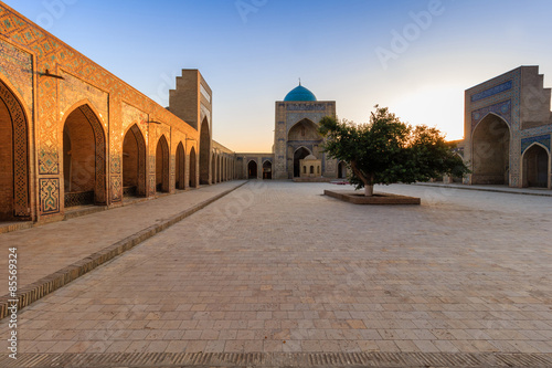 View of Kolon mosque at sunset, Bukhara, Uzbekistan. photo