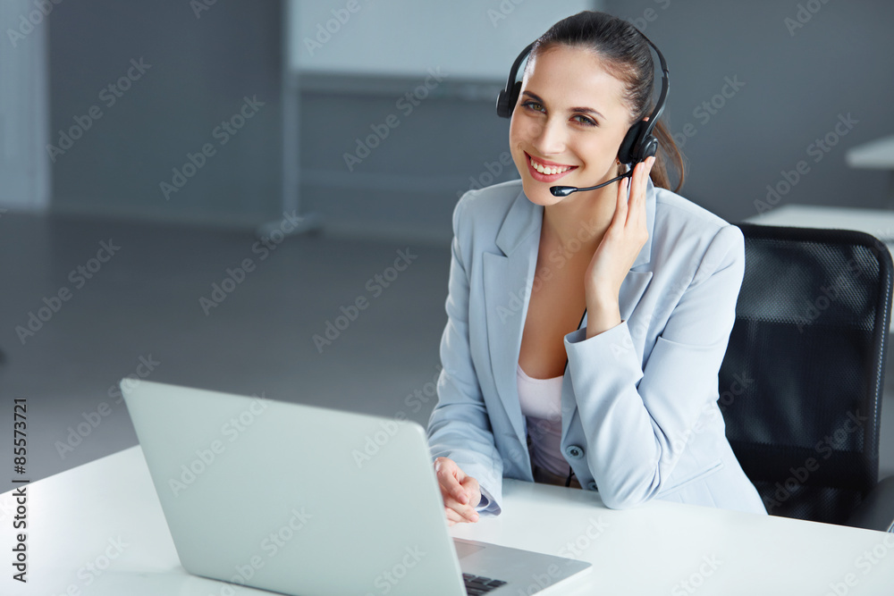Call Center Operator Sitting Infront of Her Computer Call Center Operator Sitting Infront of Her Computer