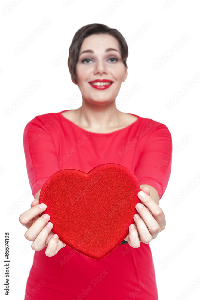 Beautiful plus size woman with red heart. Focus on heart Beautiful plus size woman with red heart. Focus on heart