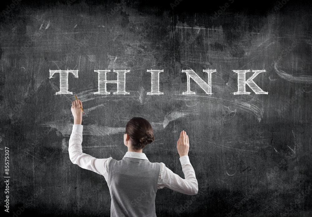 businesswoman drawing think on a blackboard businesswoman drawing think on a blackboard