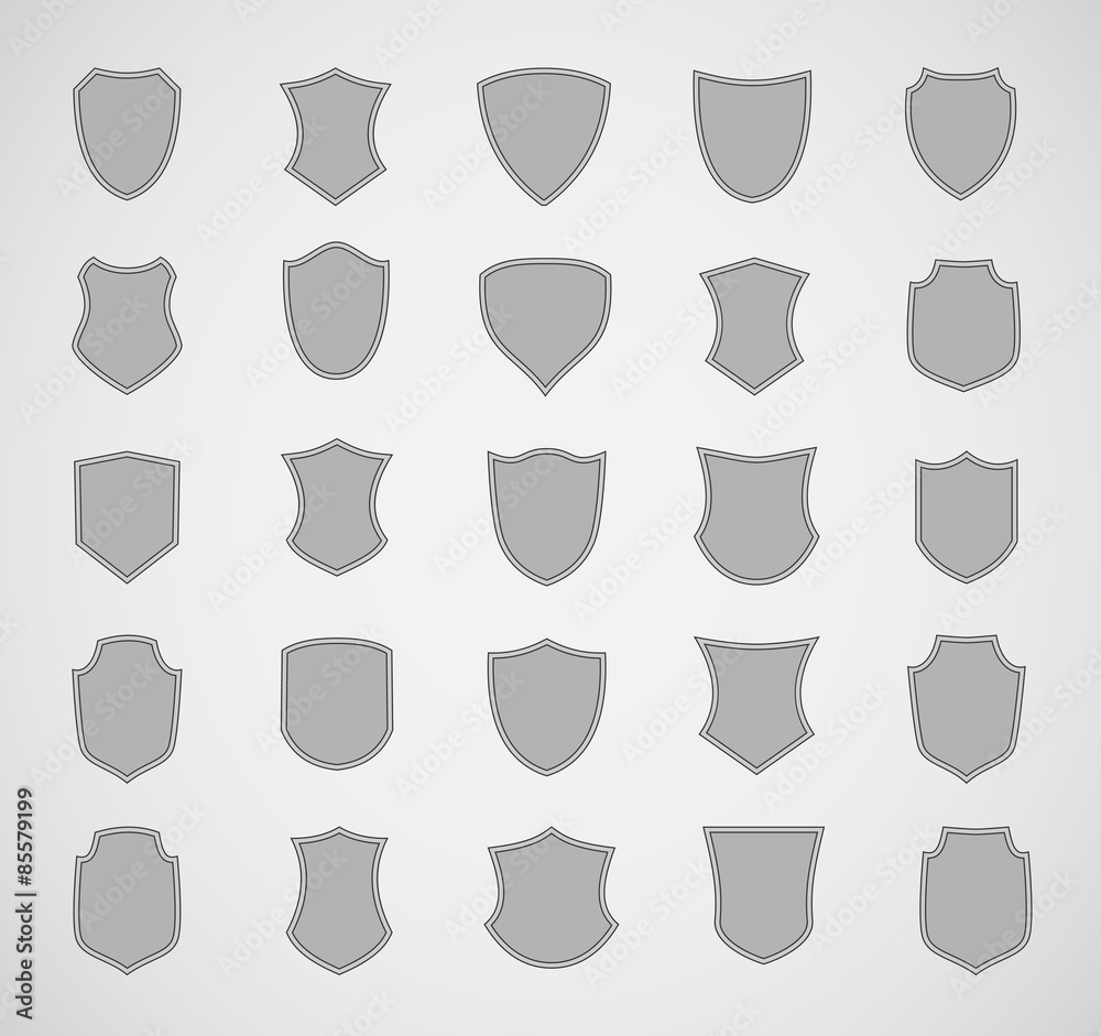 Grey silhouette shield design set of various shapes