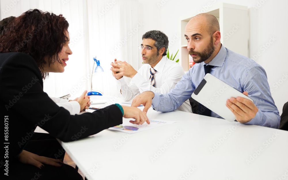 Business people at work in their office