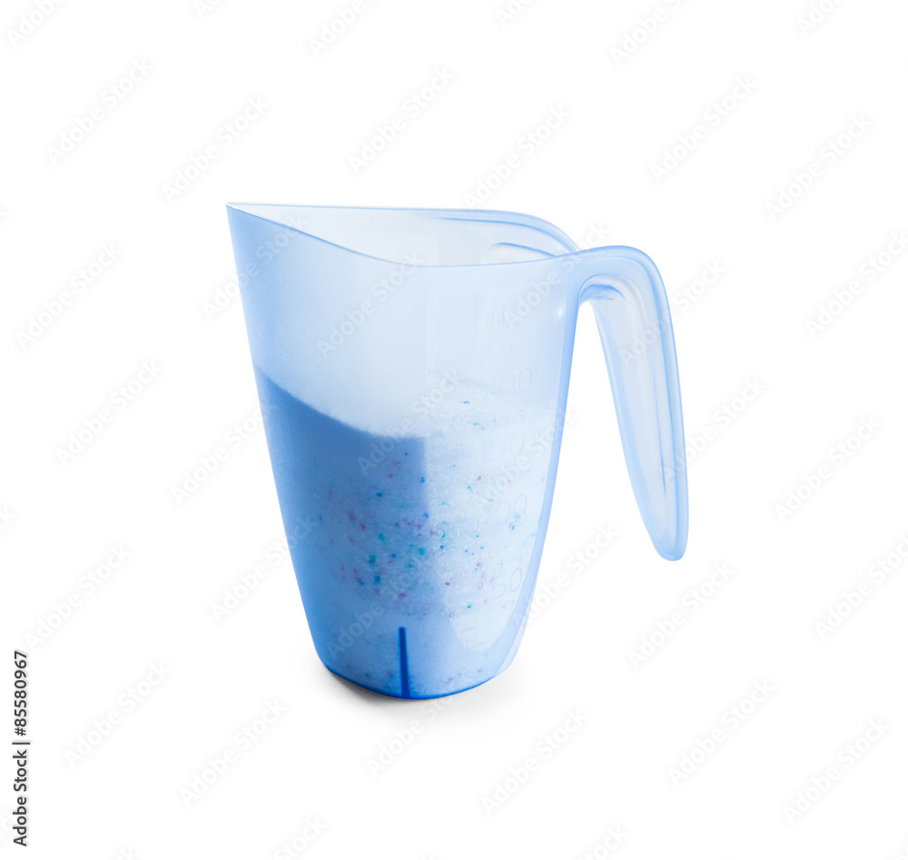 washing powder in a measuring cup