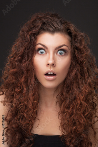 woman with healthy brown curly hair