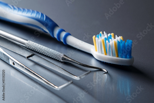 Toothbrush and dental equipment