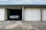 One-car garages a storage and parking facility