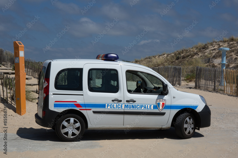 French car police doing patrol on the beach French car police doing patrol on the beach