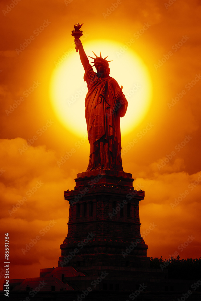 liberty statue at sunset liberty statue at sunset