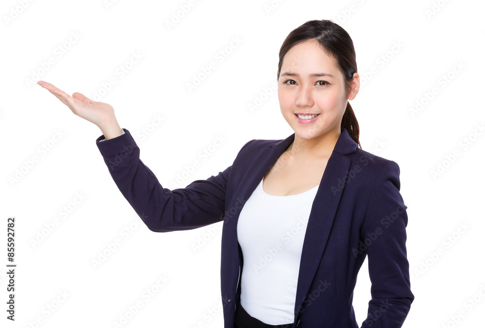 Young businesswoman with hand presentation Young businesswoman with hand presentation