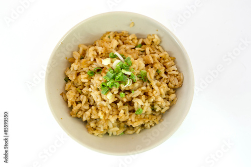 garlic fried rice with vegetable on top