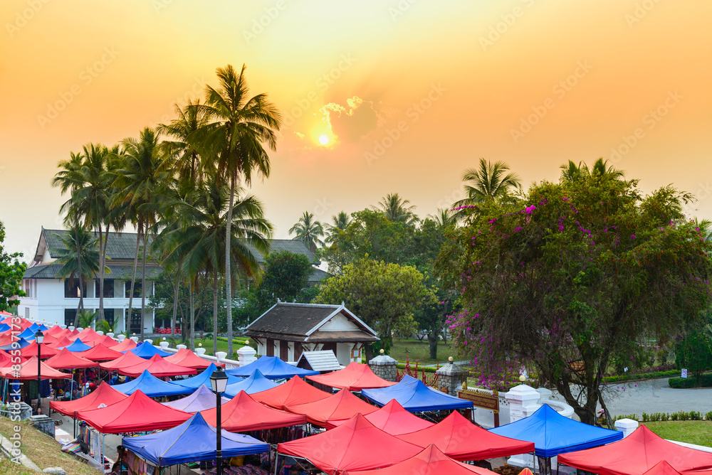 Colorful umbrellas of Luang Prabang Night market in Laos at sunr