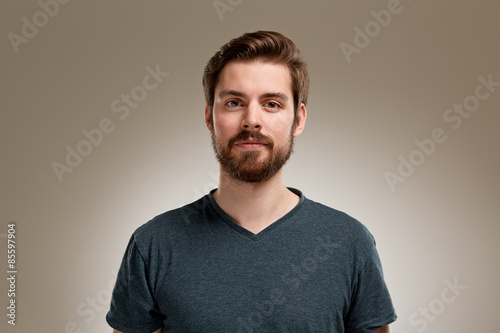 Portrait of young man with beard
