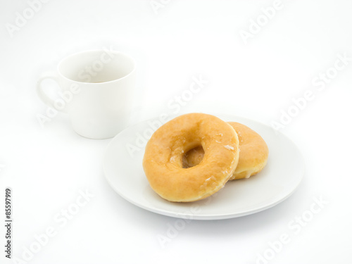 Donut isolated  and cup of coffee on white background