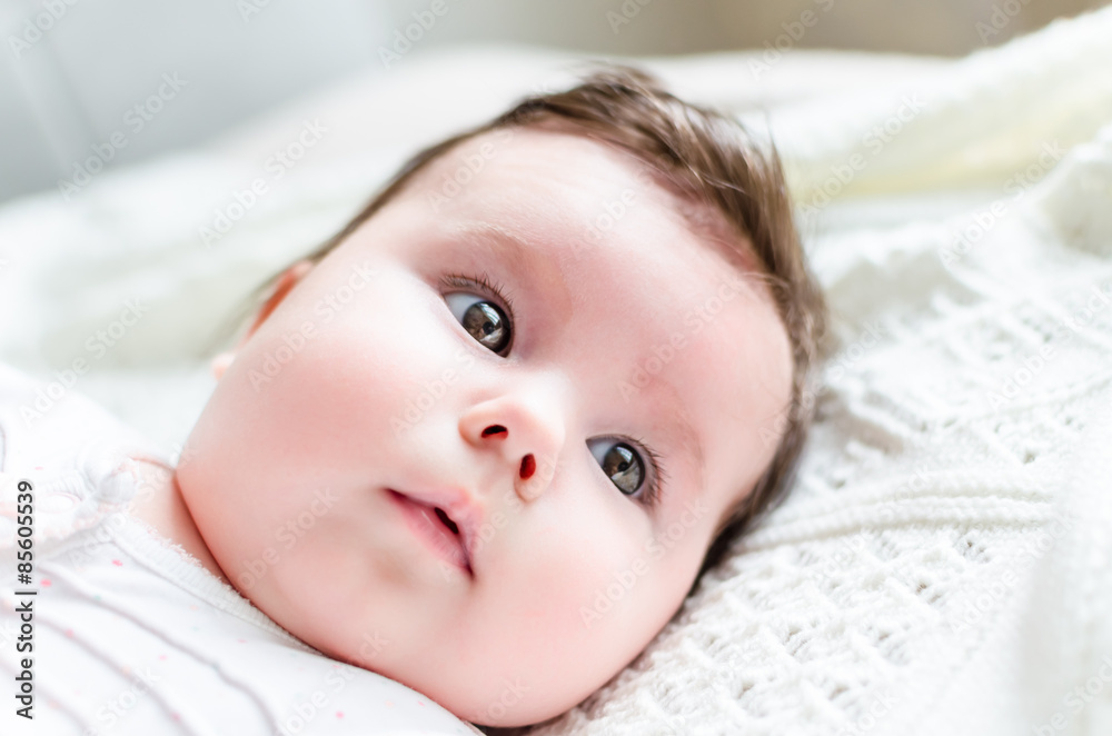 Portrait of cute caucasian little baby girl in backlight Portrait of cute caucasian little baby girl in backlight