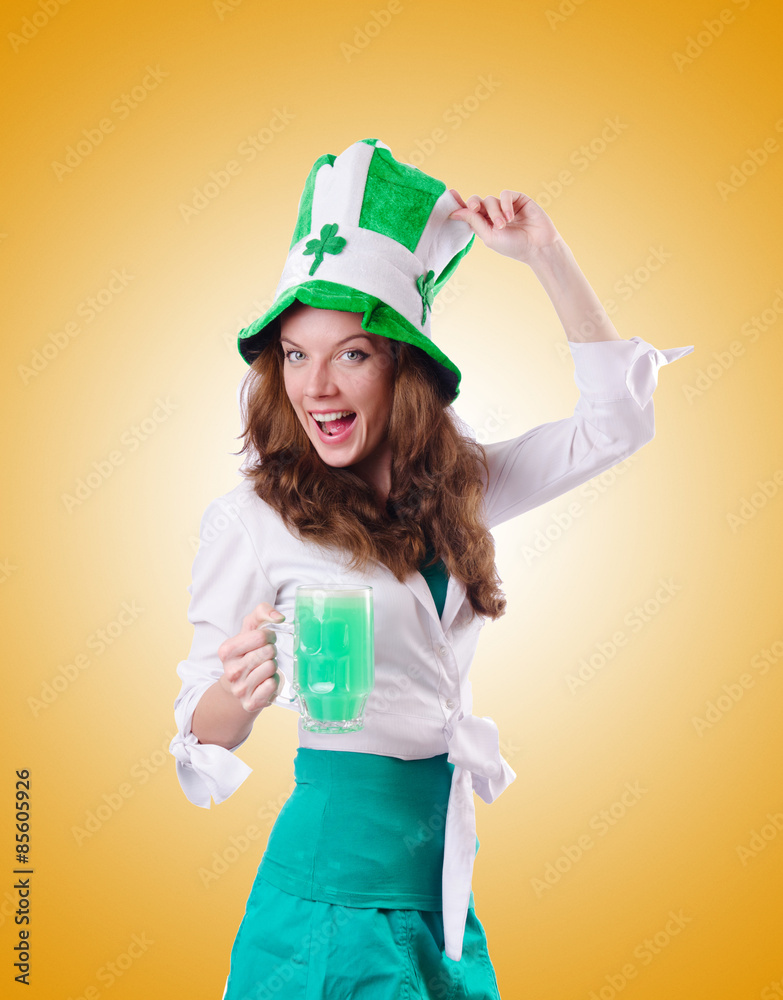 Young girl in saint patrick celebration concept Young girl in saint patrick celebration concept