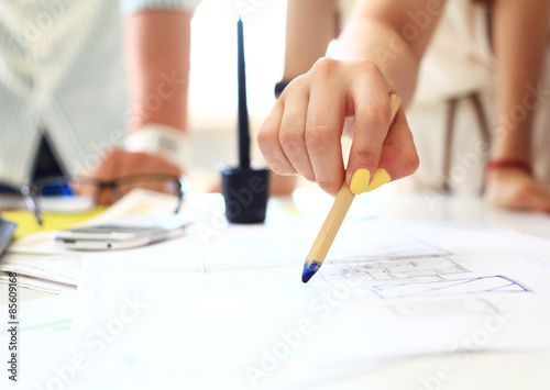 Young female engineer working in office