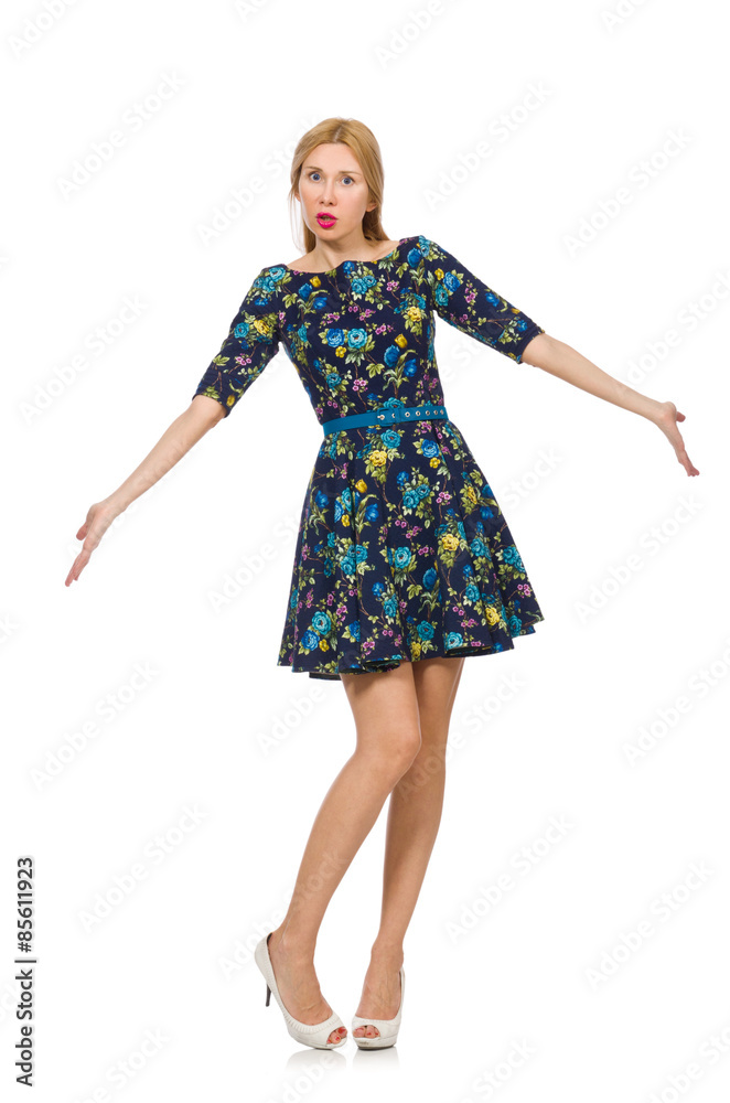 Fototapeta premium Woman in dark blue floral dress isolated on white
