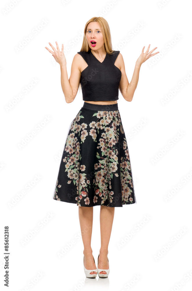 Fototapeta premium Woman in floral dark skirt isolated on white