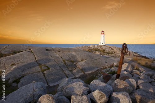 Billede på lærred peggys cove lighthouse nova scotia sunset